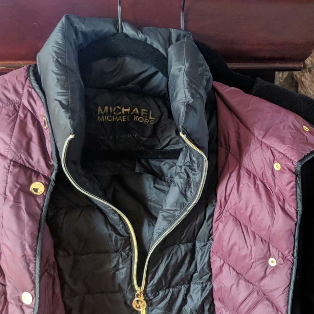 Michael Kors aubergine vest with hood, never worn.
